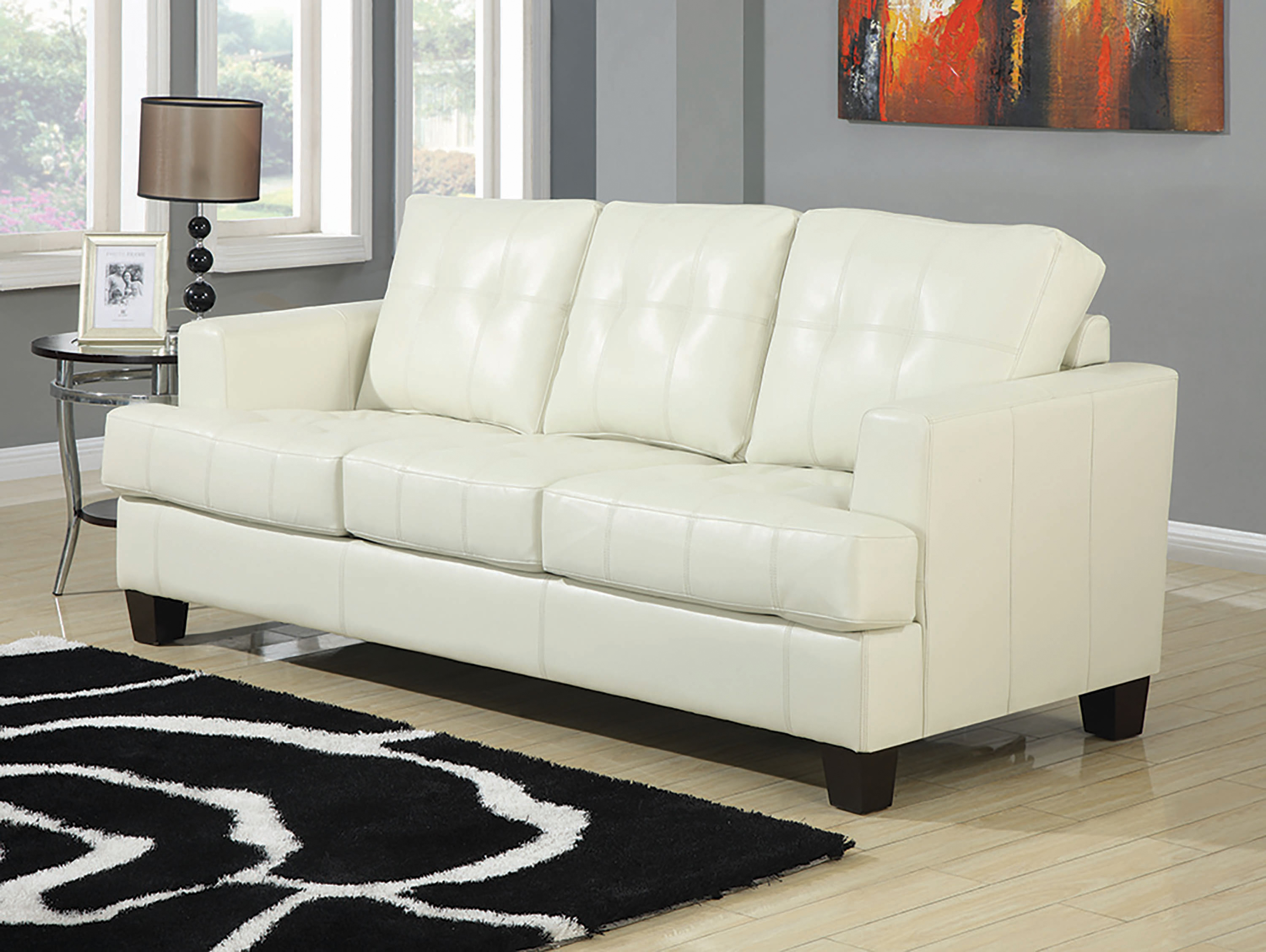 cream faux leather sleeper sofa